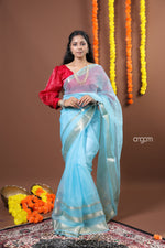 Load image into Gallery viewer, Sky Blue Organza Saree with Silver Zari Border – Ethereal Elegance