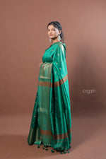 Load image into Gallery viewer, Elegant Green Art Dupion Silk Saree with Golden Zari Work