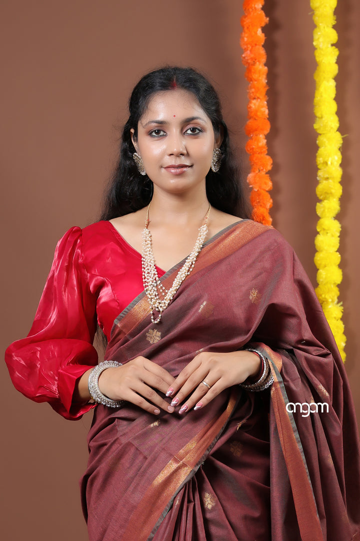 Elegant Brown Liva Saree with Zari Motifs and Border Design