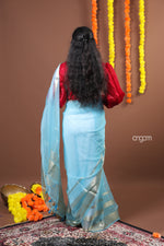 Load image into Gallery viewer, Sky Blue Organza Saree with Silver Zari Border – Ethereal Elegance

