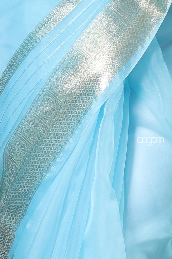 Sky Blue Organza Saree with Silver Zari Border – Ethereal Elegance