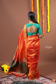 Vibrant Orange Art Dupion Saree with Floral Motifs and Border