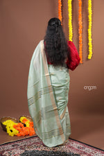 Load image into Gallery viewer, Graceful Light Green Liva Saree with Golden Border and Elegance
