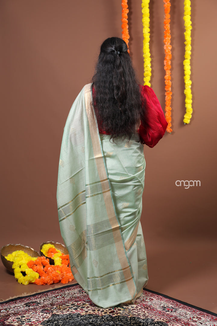 Graceful Light Green Liva Saree with Golden Border and Elegance