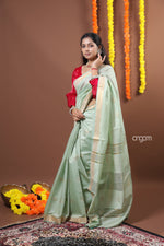Load image into Gallery viewer, Graceful Light Green Liva Saree with Golden Border and Elegance

