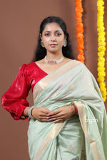 Load image into Gallery viewer, Graceful Light Green Liva Saree with Golden Border and Elegance
