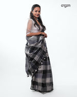 Load image into Gallery viewer, Graceful Black and White Checked Linen Saree with Tassel Detailing

