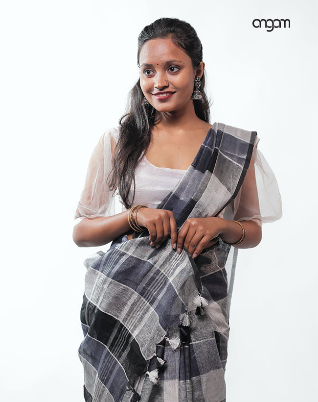 Graceful Black and White Checked Linen Saree with Tassel Detailing