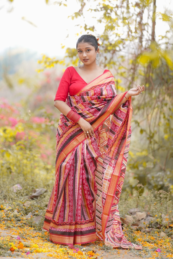Elegant Red Malbari Silk Saree with Traditional Tribal Patterns