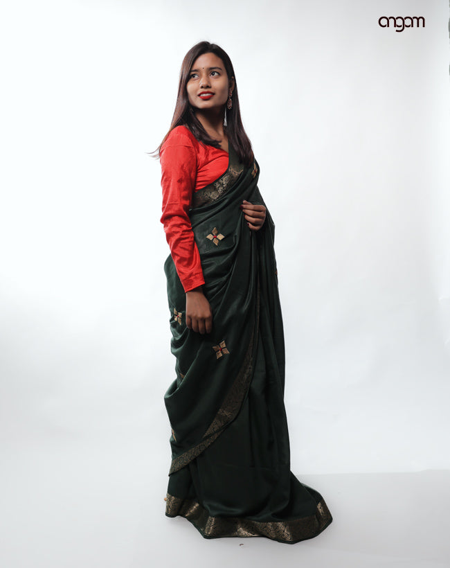 Elegant Dark Green Liva Saree with Golden Zari Motifs & Border